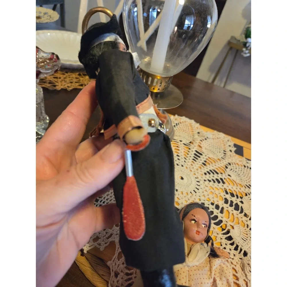 vintage Argentine gaucho folk art doll featuring a hand-painted face